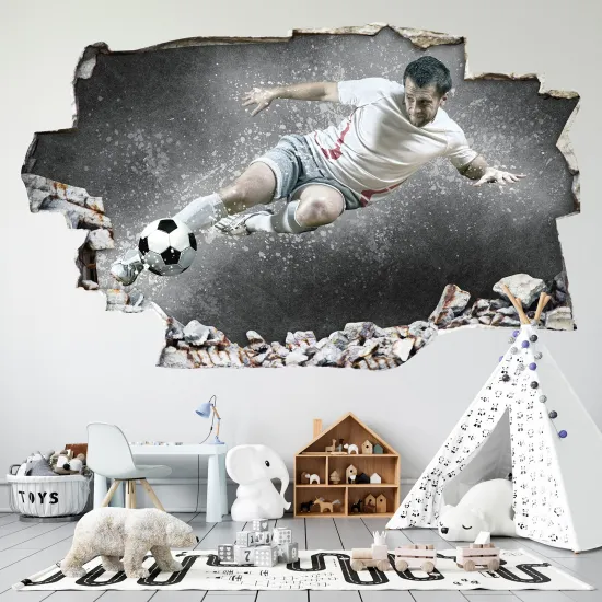 Stickers Trompe l'oeil trou dans le mur - Footballeur